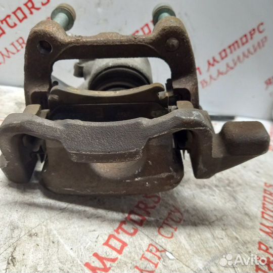 Суппорт тормозной задний левый Volkswagen Golf 5