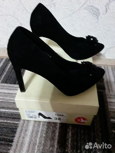 Туфли на высоком каблуке