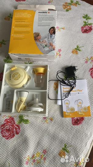 Молокоотсос medela swing flex электрический