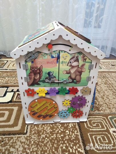 Игрушка развивающий домик
