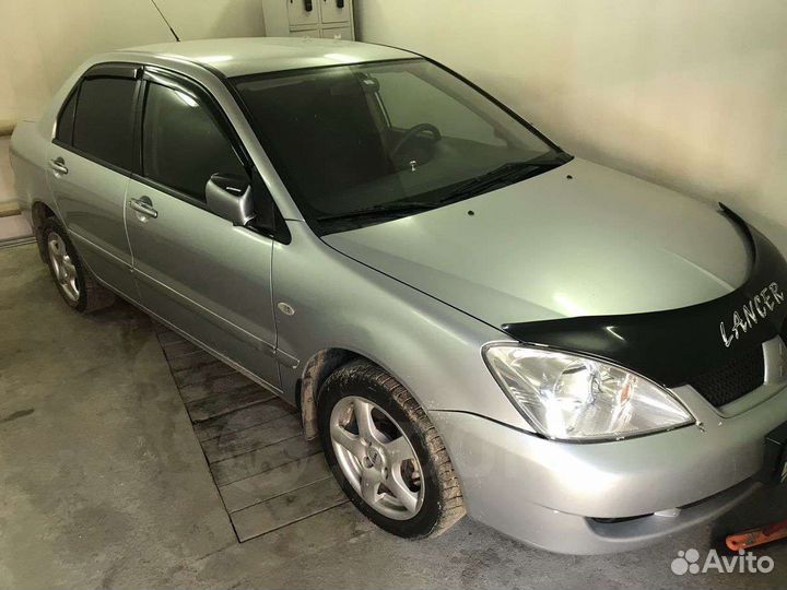 Лансер 9 1.6мт разбор