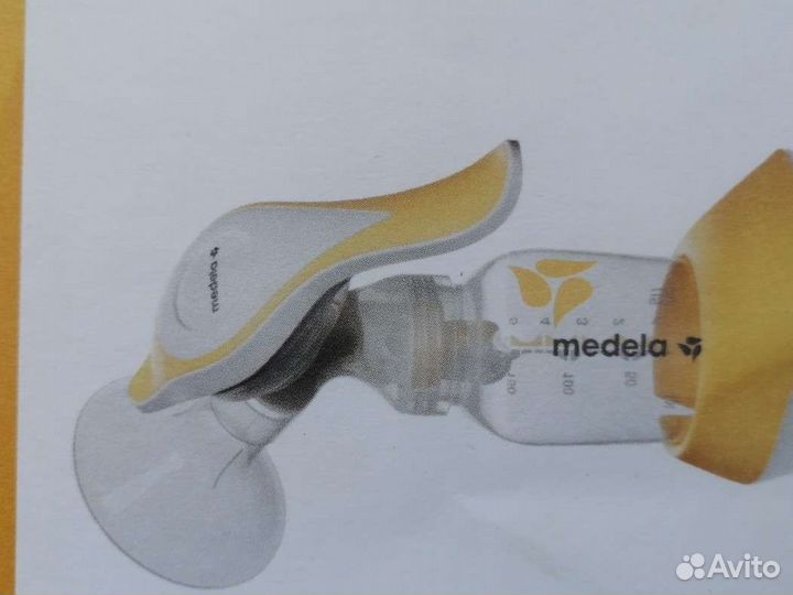 Молокоотсос ручной medela + соска medela calma
