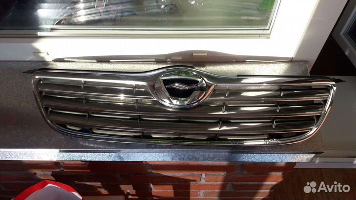 Решётка радиатора Toyota Corolla NZE121