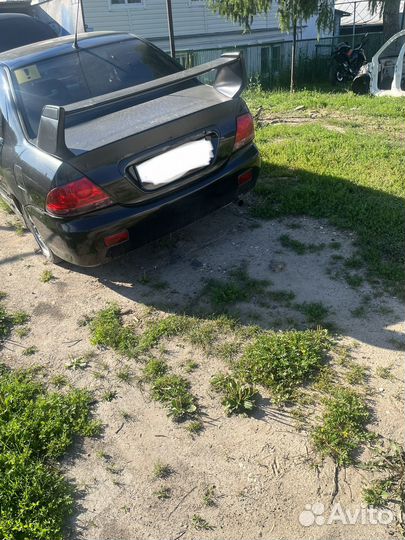 Крышка багажника + бампер lancer 9