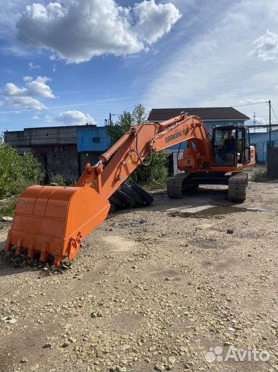 Гусеничный экскаватор