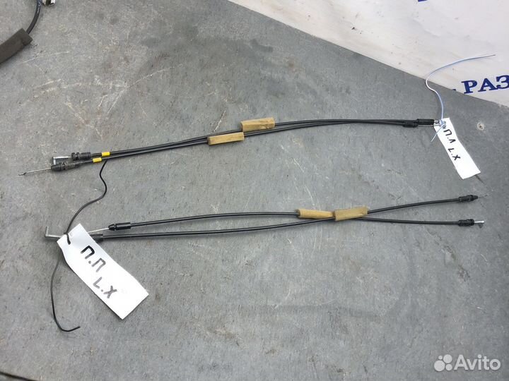 Трос передней двери lancer 10