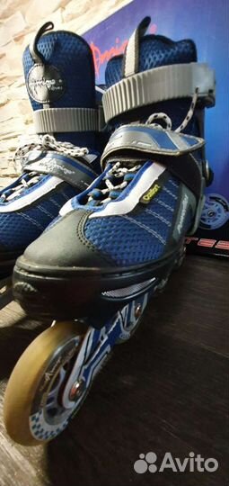 Роликовые коньки