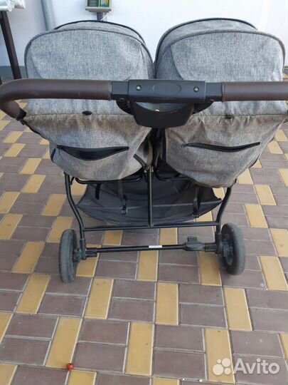 Коляска для погодок