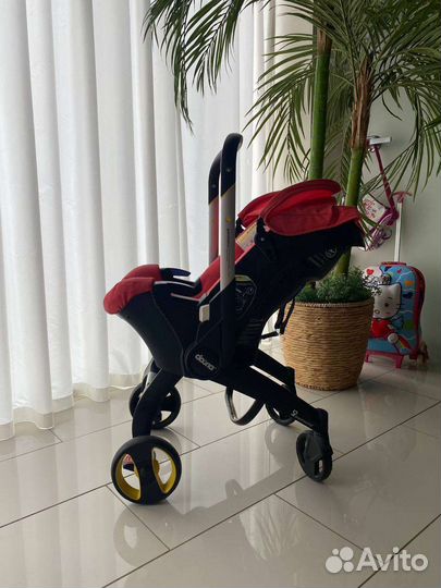 Коляска - автокресло doona + база lsofix