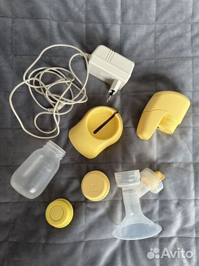 Молокоотсос medela электрический