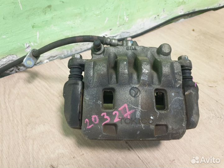 Суппорт передний левый Subaru Impreza Forester