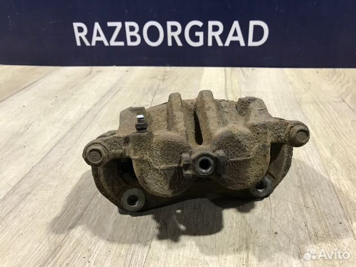 Суппорт передний левый Ssangyong Korando C200 2.0