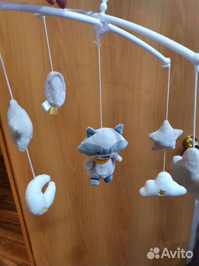 Музыкальный мобиль в кроватку