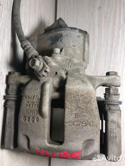 Тормозной суппорт задний лев прав VW Passat B6