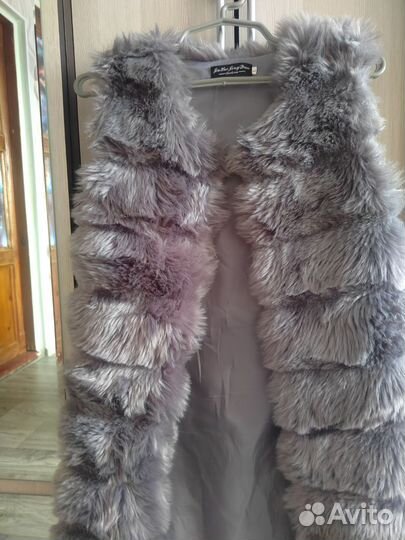 Жилетка меховая женская