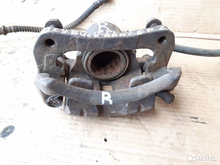 Суппорт передний Митцубиси Ланцер CB 92-00