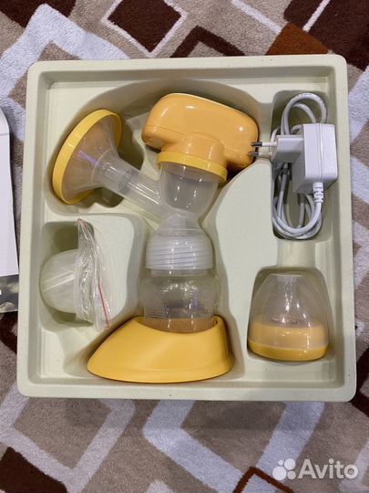 Молокоотсос электрический