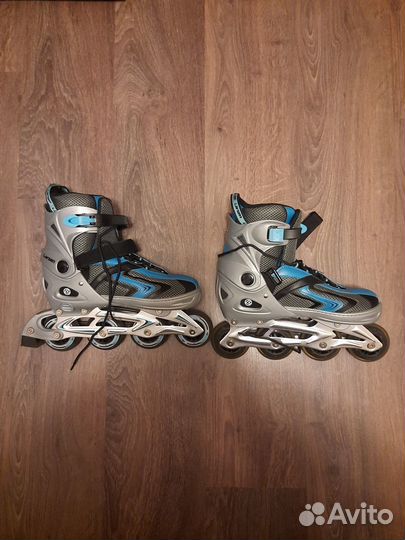 Роликовые коньки