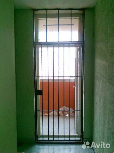 Дверь металлическая решетчатая