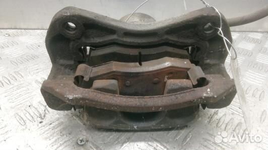 Суппорт тормозной передний правый KIA RIO 2 (5BR09