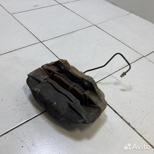 Суппорт передний левый Land Rover Defender 110 L31