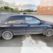 Mitsubishi Lancer 1.3 MT, 2004, 230 000 км, с пробегом, цена 335 000 руб.