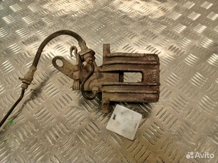 Суппорт тормозной задний левый Skoda Octavia