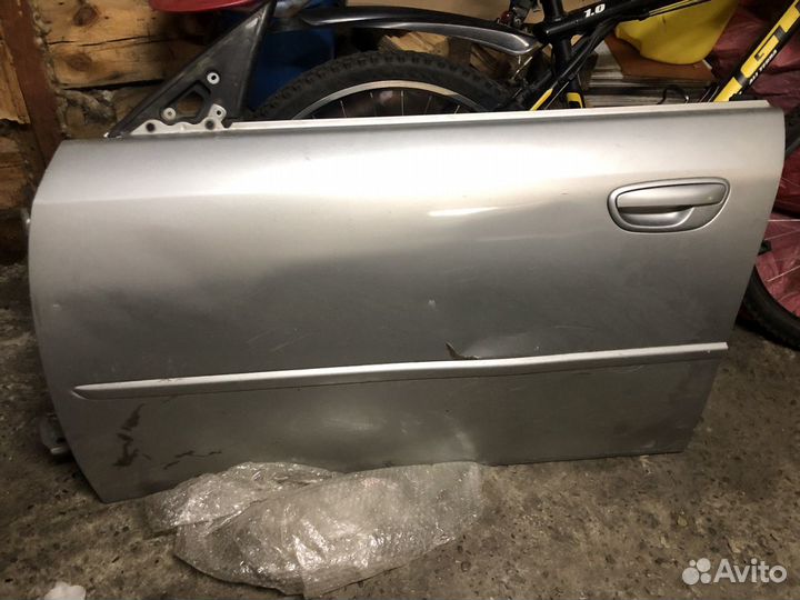 Дверь передняя левая Subaru Legacy