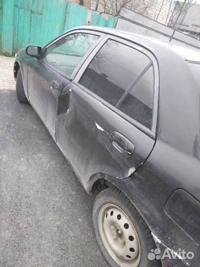 Mazda Familia 1.5 AT, 1998, 400 000 км