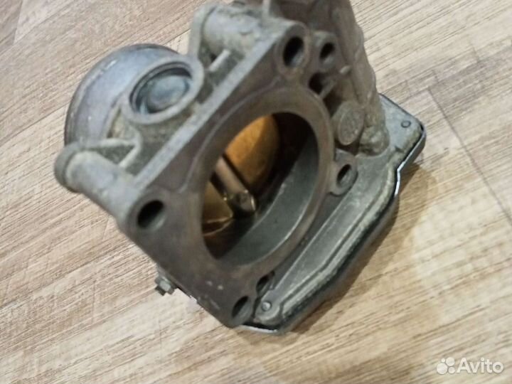 Дроссель Ниссан