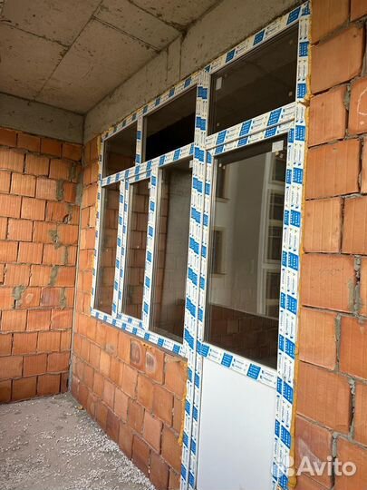 Пластиковые окна с балконом