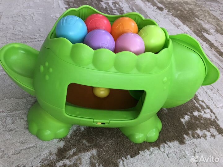 Динозавр fisher price