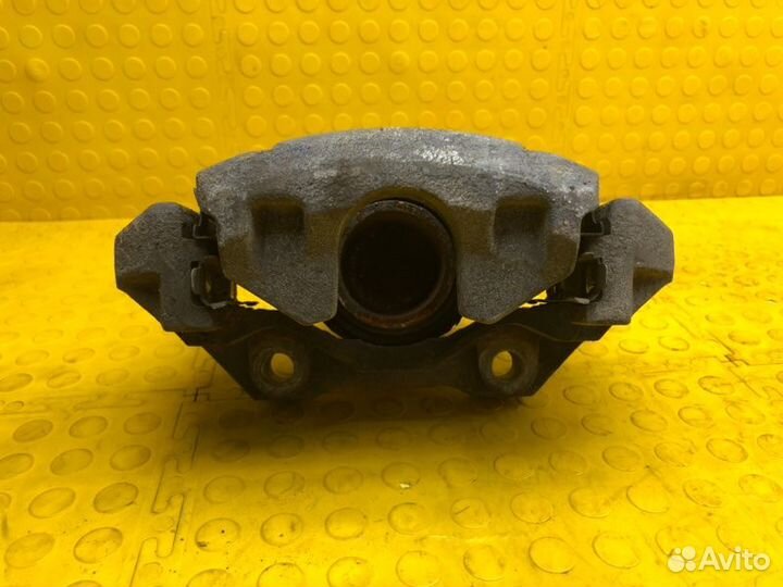 Суппорт тормозной передний левый Volkswagen Polo