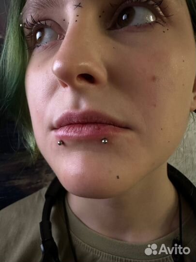 Мастер по пирсингу