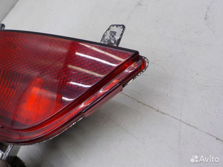 Фонарь заднего бампера Renault Logan 2014