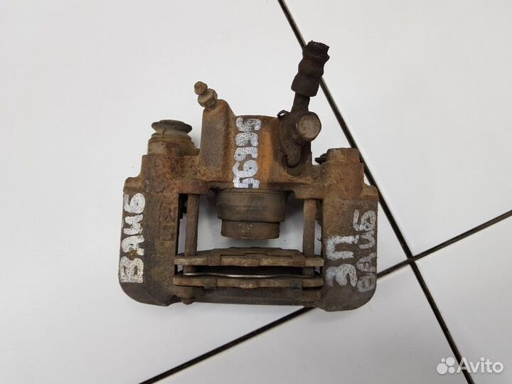 Суппорт задний правый (Pontiac Vibe)