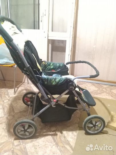 Сидящая детская коляска красный