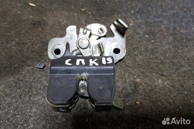 Замок крышки багажника Kia Spectra