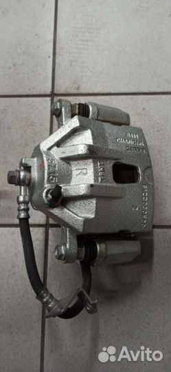 Суппорт тормозной передний Changan CS35 Plus