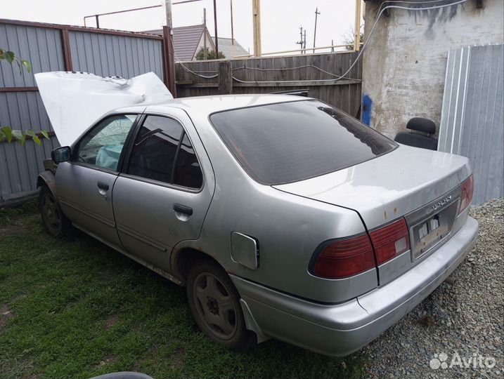 Бампер задний nissan sunny fb14