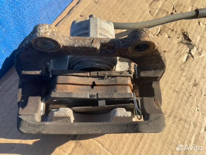 Суппорт задний правый Chevrolet Trailblazer GMT360