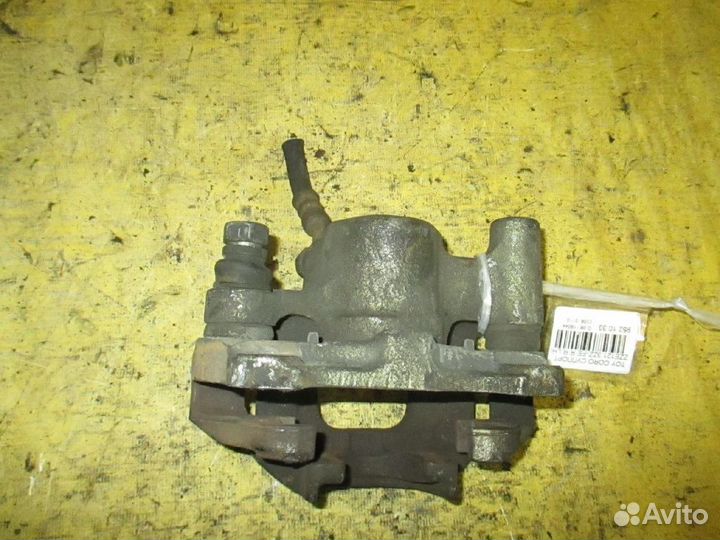 Суппорт Toyota Corolla ZZE121 (Заднее Правое)