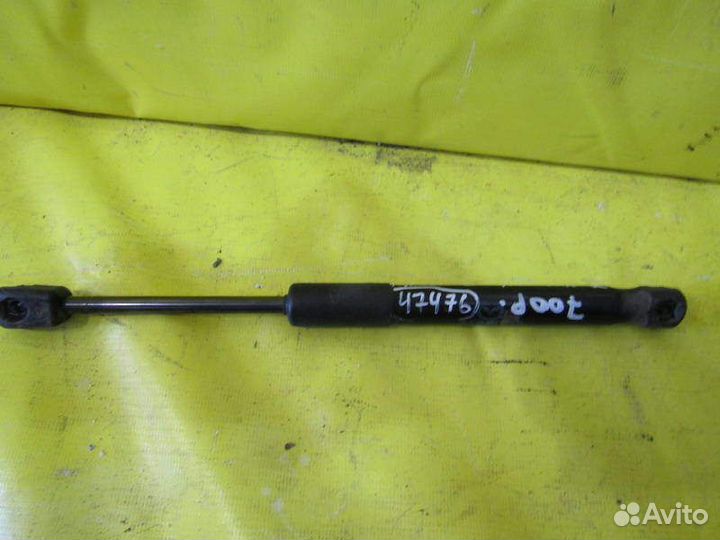 Амортизатор багажника правый Mazda 3 09-13г 47476