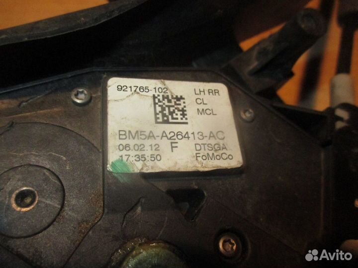 Замок двери задней левой (Ford Focus)