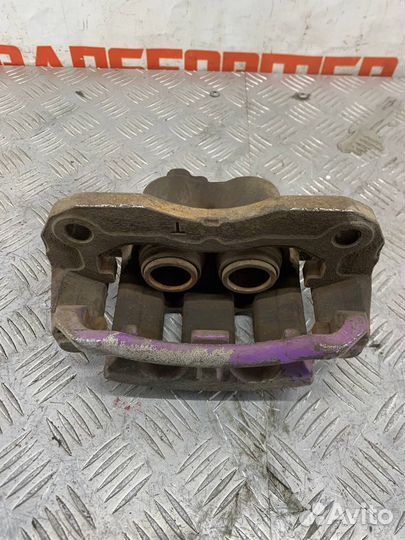 Суппорт тормозной передний левый Мазда Милления TA