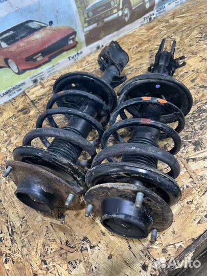 Стойка амортизатор пер пара Киа Спортейж 2