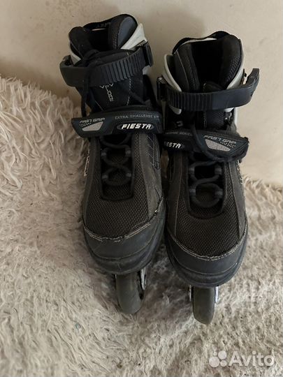 Роликовые коньки