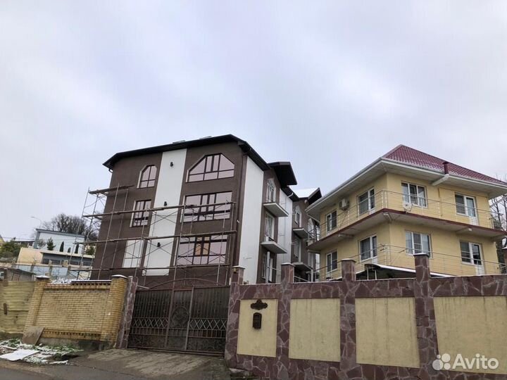 Фасадные работы из жидкого травертина asman