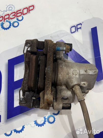 Суппорт тормозной задний левый Ford Focus 3