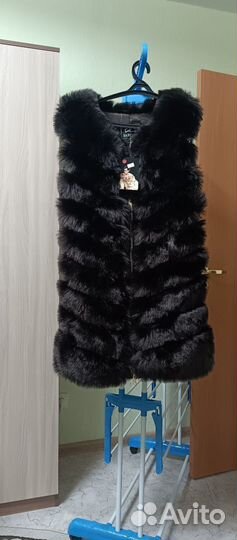 Жилетка меховая женская